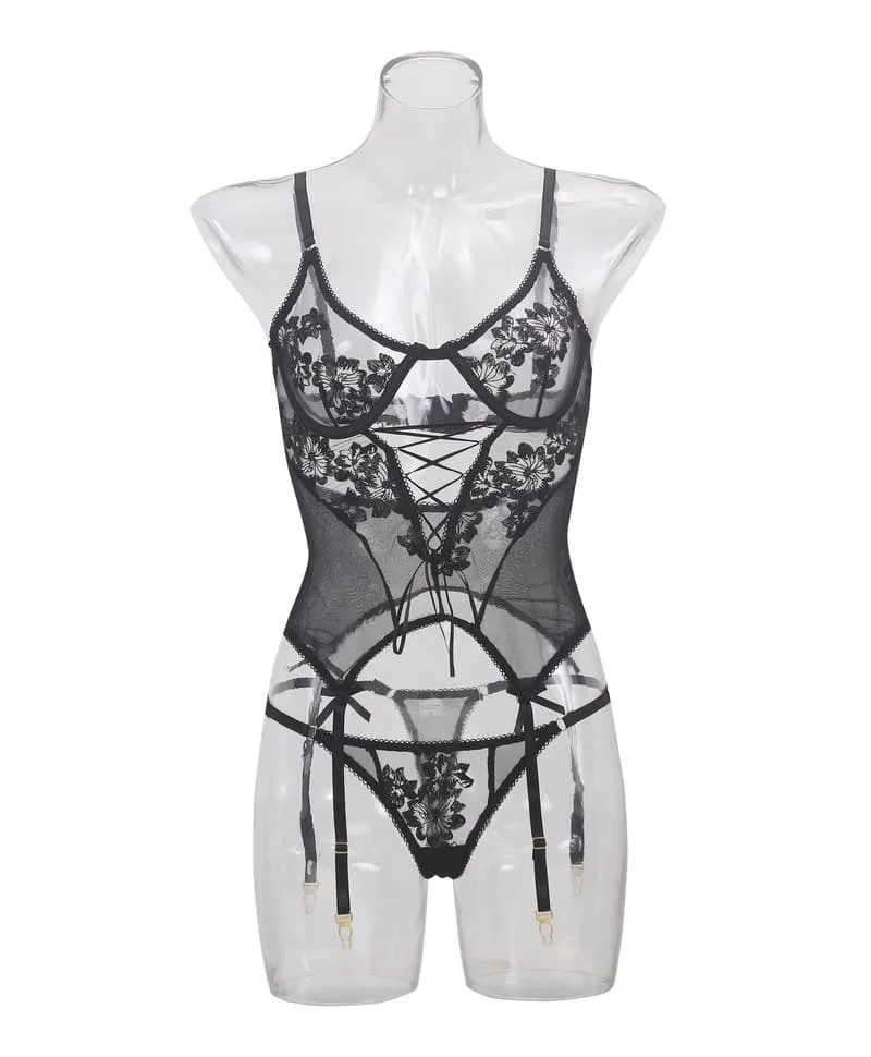 Vorderansicht des Korsetts mit Strumpfbändern aus transparentem Mesh-Blumenmuster
