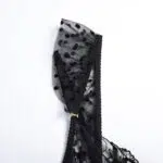 Schwarzes, sexy, transparentes Spitzen-BH-Set mit gerüschten Strumpfband-Riemendetails Schwarzes, sexy, transparentes Spitzen-BH-Set mit gerüschten Strumpfband-Riemendetails