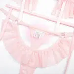 Conjunto de sutiã transparente rosa com detalhes de design de pompons
