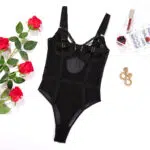 Wholesale Black Bodysuit with See-Through Mesh and Backless Design Over View