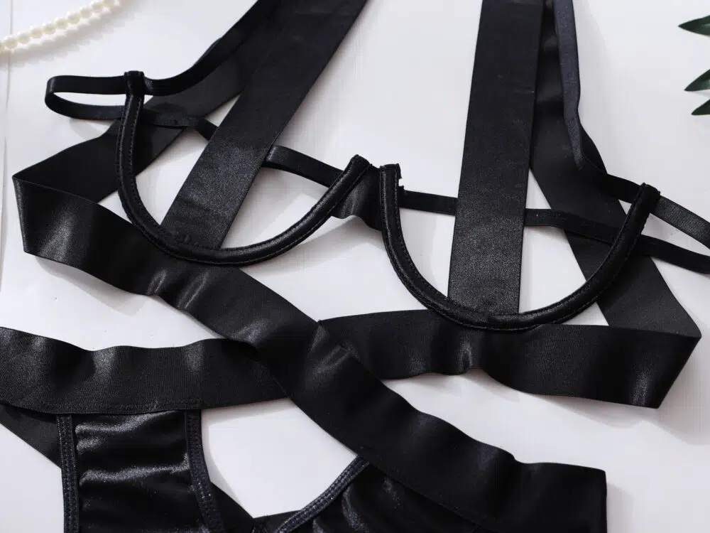 Wholesale black Spandex Female Bodysuit with Hollow Design Details