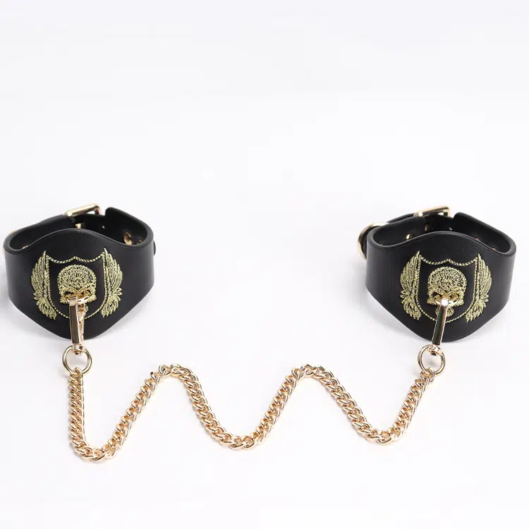 Puño de mano bordado con calavera negra al por mayor Bondage Gear