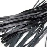 Glimrende rød glitter Flogger detaljer